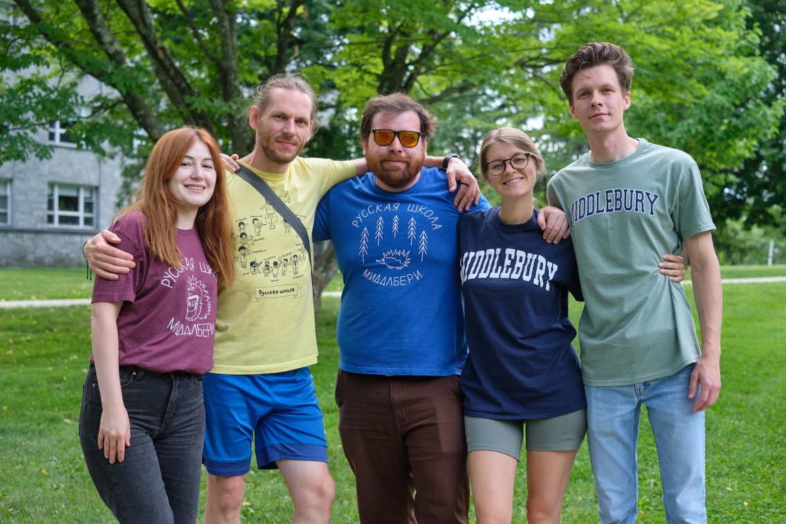 Five bilingual assistants at the School of Russian standing outside.