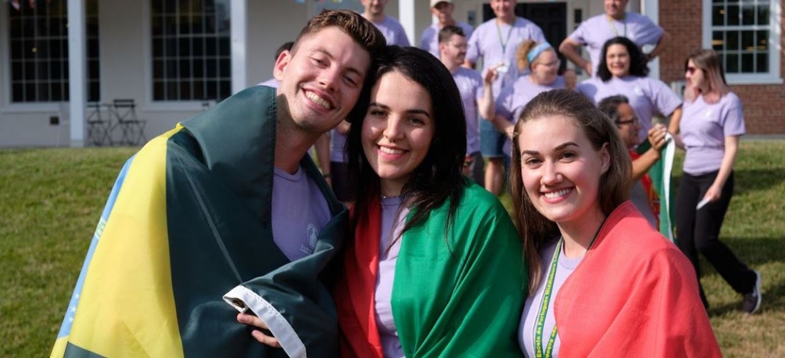 Portuguese students with flags from around the world.