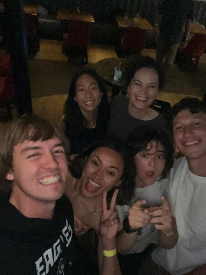 A man and his friends at the School of Spanish. 