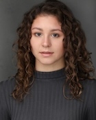 A woman in a black shirt. 