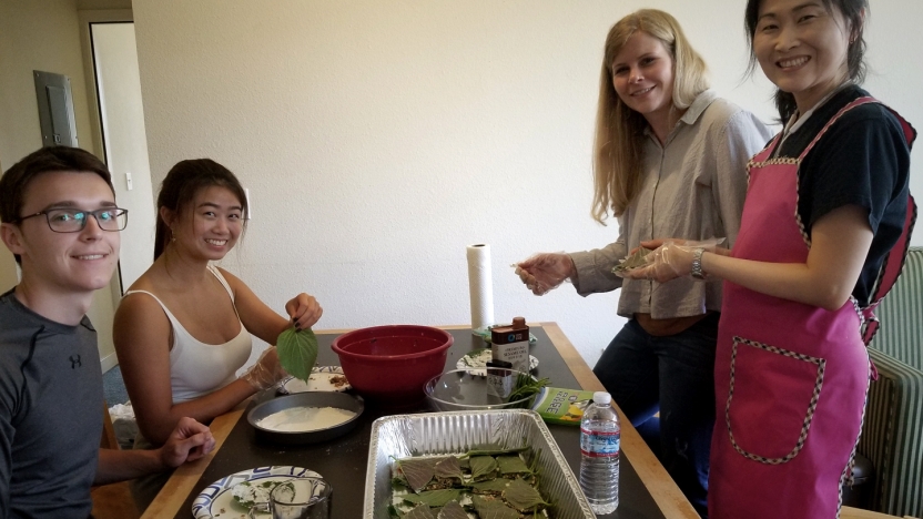 Students cooking in kitchen.