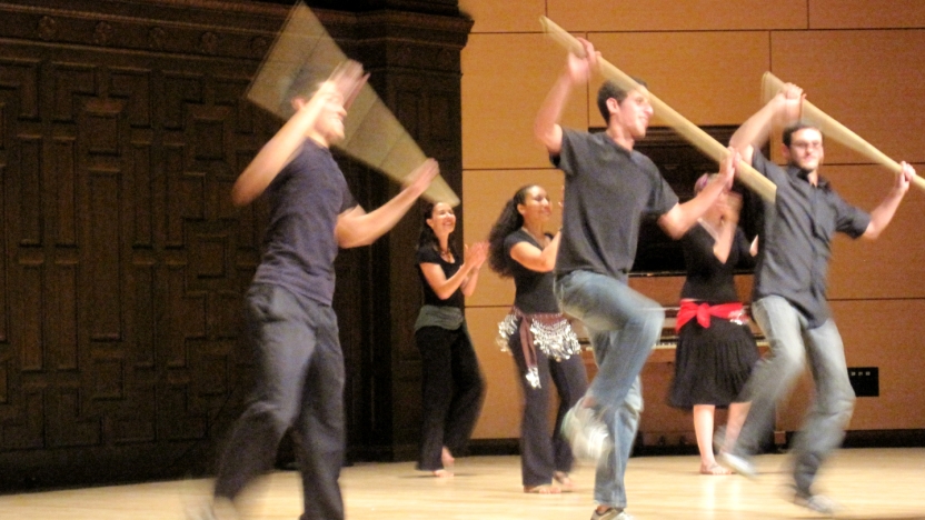 Arabic students participating in a talent show.