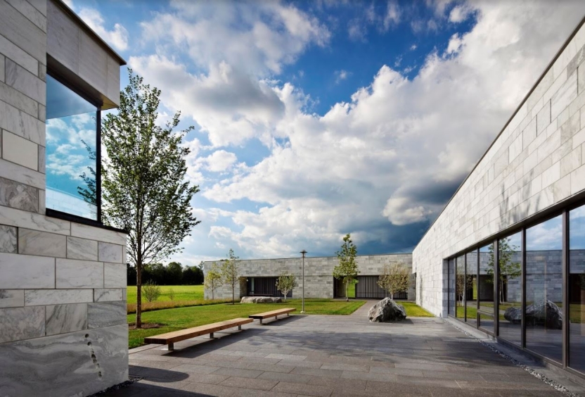 A beautiful picture of the Bennington Campus - blue sky and white clouds!
