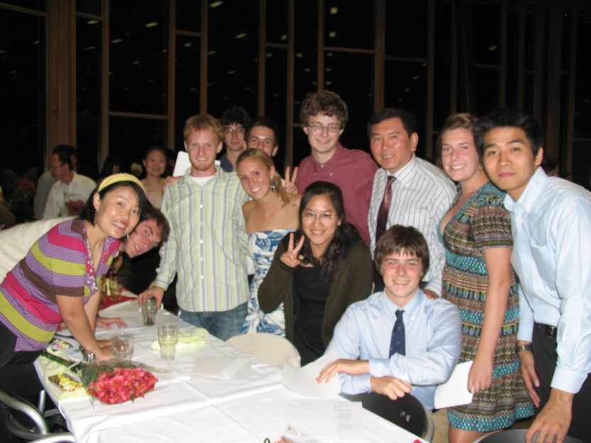 A group of students eats in a dining room. 
