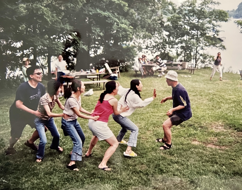 Students in a line with faculty at the Chinese School at Middlebury College. 