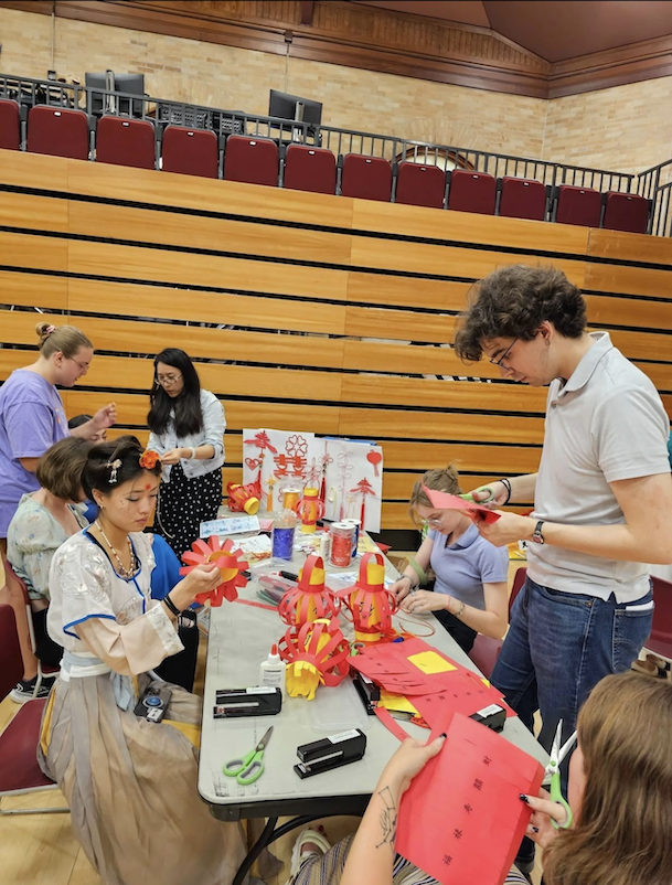 Students make Chinese crafts. 