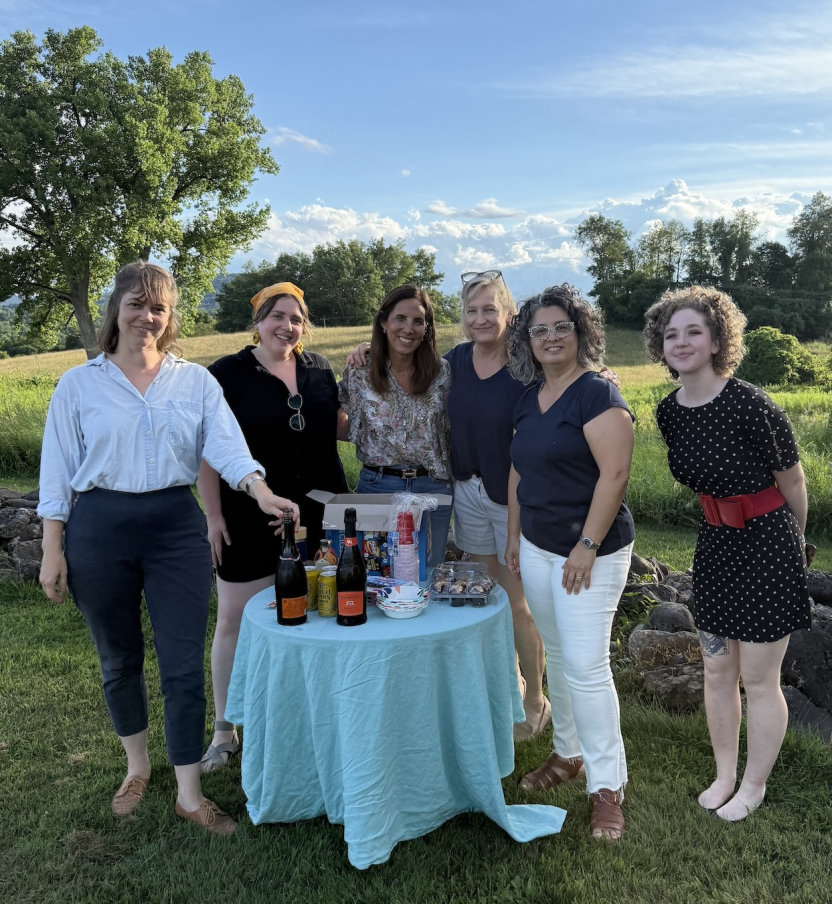 A group of Italian Schools students attend a party outside. 