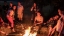 French Language Schools students roasting marshmallows