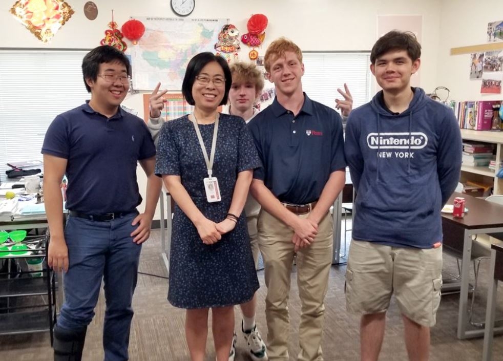 Middlebury Language Schools master’s degree student Ying Zhang with her students at Montgomery Bell Academy.