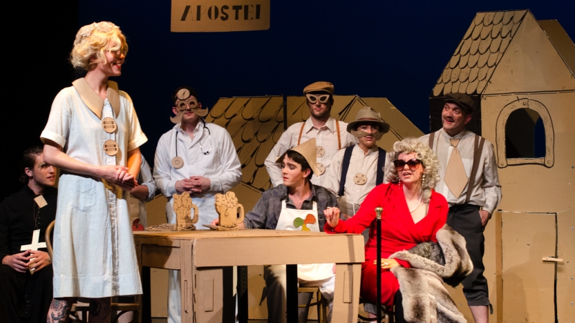Group of German School students act in a play.