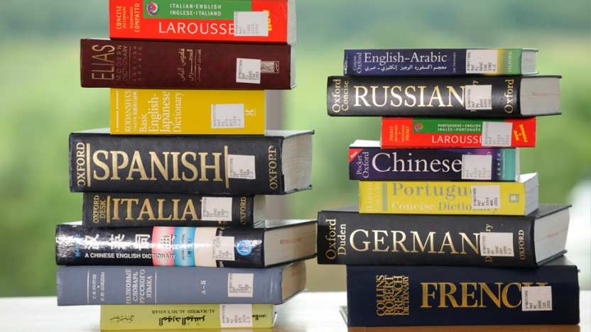 Stack of books in different languages.