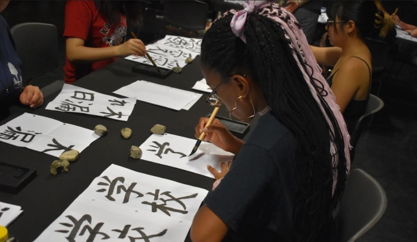 Japanese students performs a co-curricular activity.