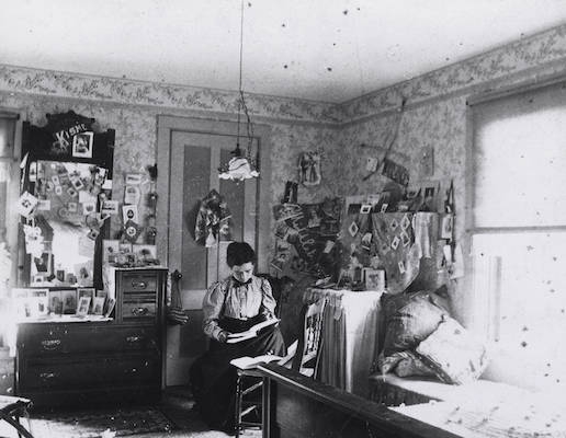 Photograph of student in dorm room