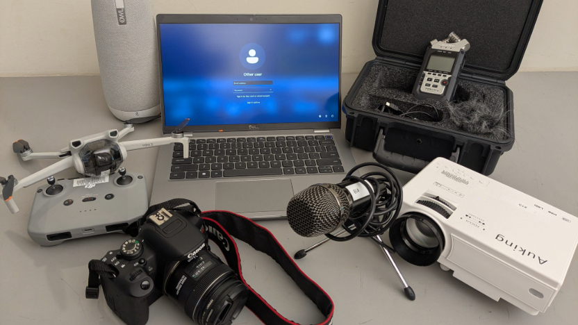 photo of technology equipment: laptop, camera, microphone, audio recorder, projector, drone
