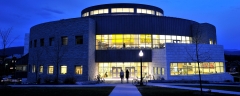 The entrance of the Davis Family Library at night