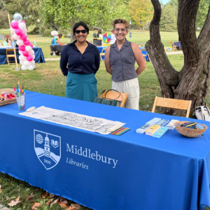 photo of two people at library table