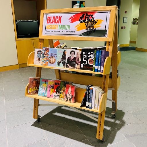 books on a display cart