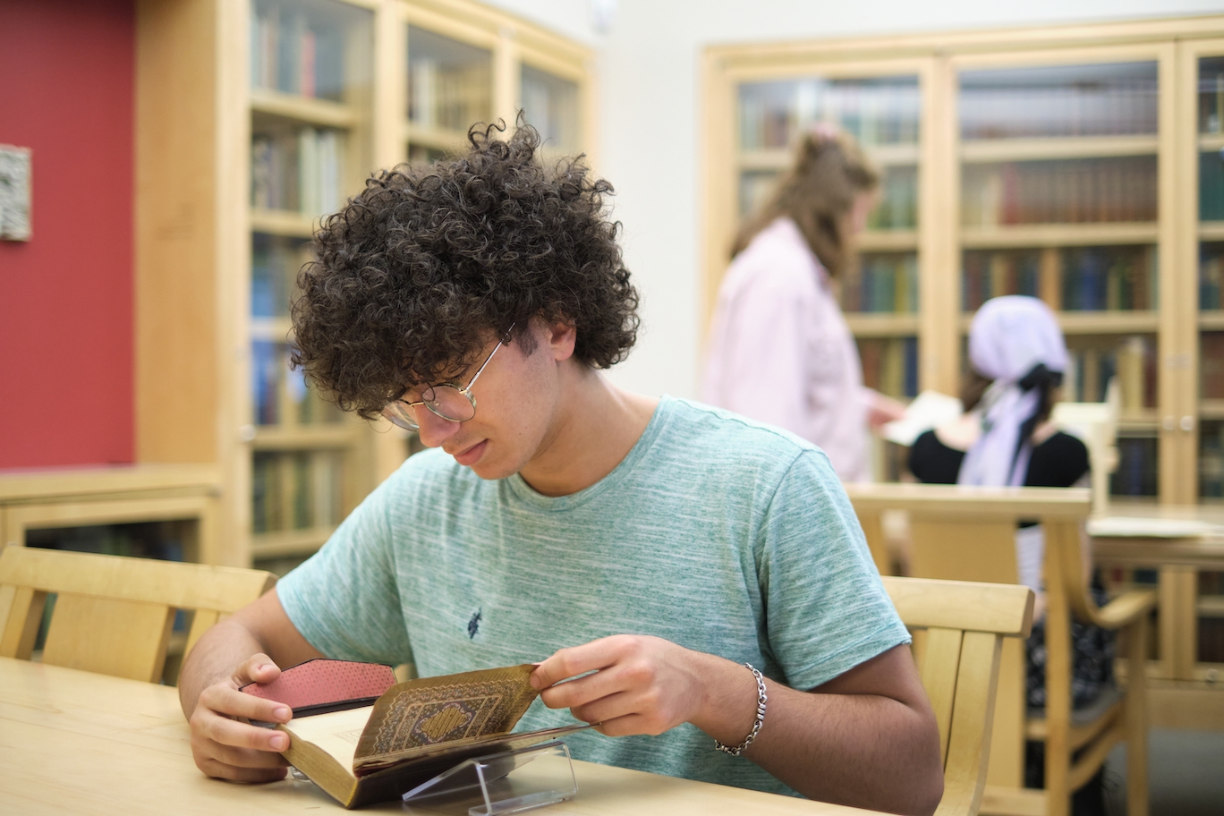Students consult rare books in the Special Collections Reading Room.