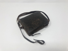Image of a Ge'ez prayer book in a carrying satchel