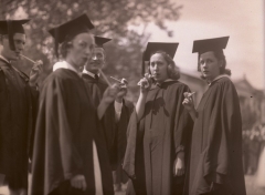 Sepia-toned photograph of students smoking pipes at commencement