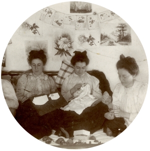 Circular image of female students knitting in a dorm room