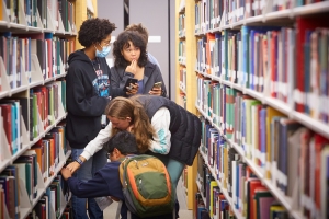 Students looking for books