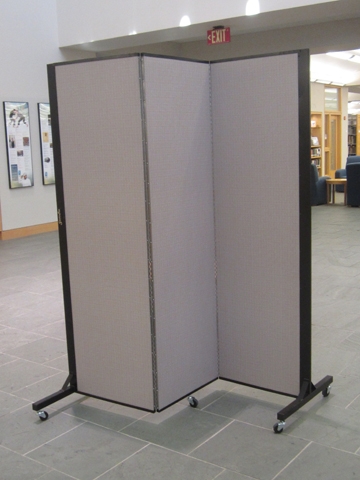 Panel standing half folded in the atrium