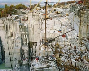 burtynsky_rock_of_ages.jpg a photo of a rock quarry by Edward Burtynsky