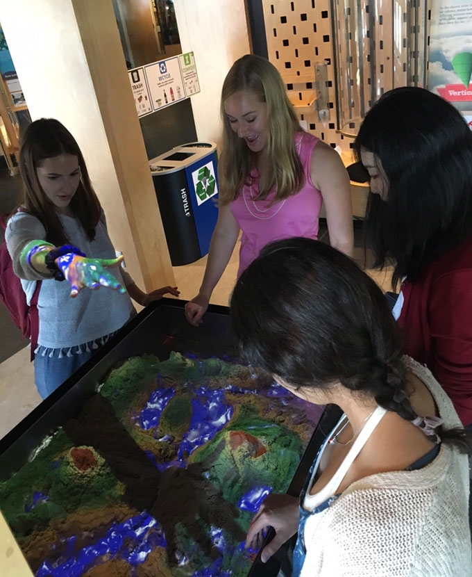2018 MuseumWorks interns enjoy an interactive science exhibit at the ECHO Leahy Center