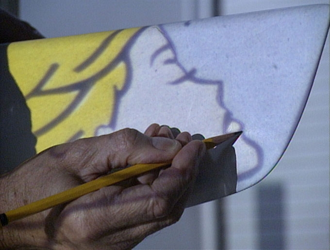 Roy Lichtenstein at work on the design for Young America
