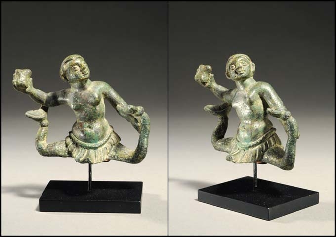 Etruscan scylla about to hurl a rock