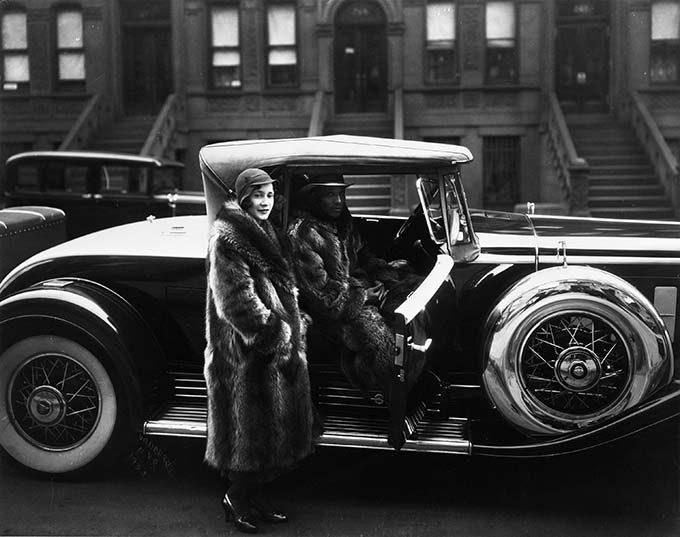 van_der_zee_harlem_couple_wearing_raccoon_coats.jpg James Van Der Zee, A Harlem Couple Wearing Raccoon Coats Standing next to a Cadillac on West 127th Street, 1932
