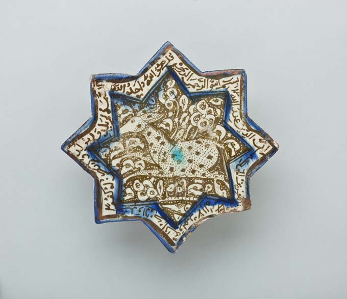 wondrous_worlds_eight_pointed_star_tile.jpg Molded Eight-Pointed Star Tile with Wild Ass