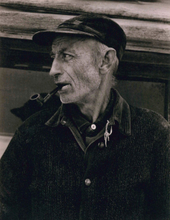 a man smoking a pipe