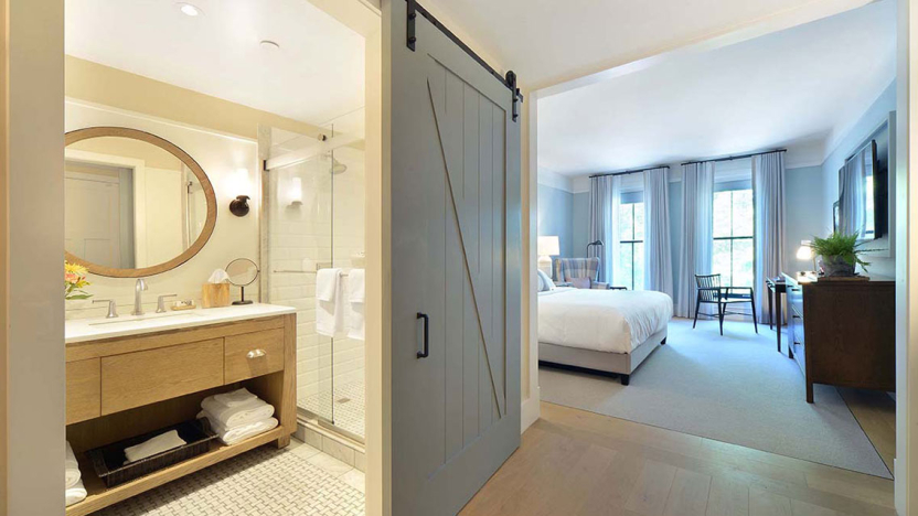 a hotel room and bathroom