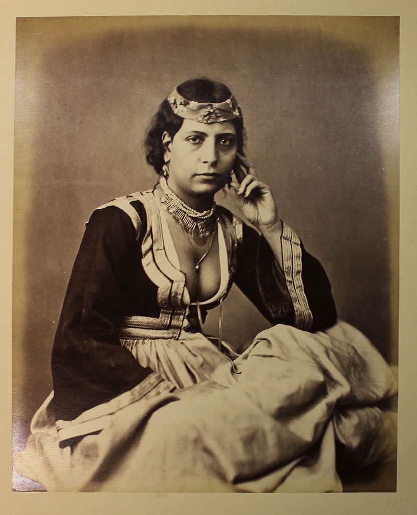 a sepia-toned photograph of a woman