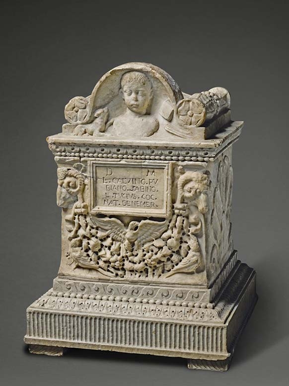 a Roman marble cinerary urn