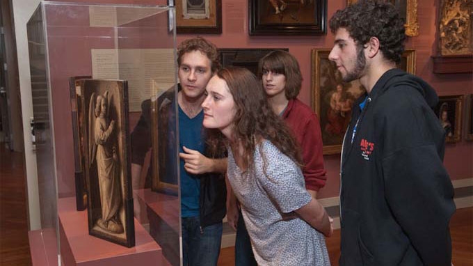 A group of Middlebury students tour the museum.