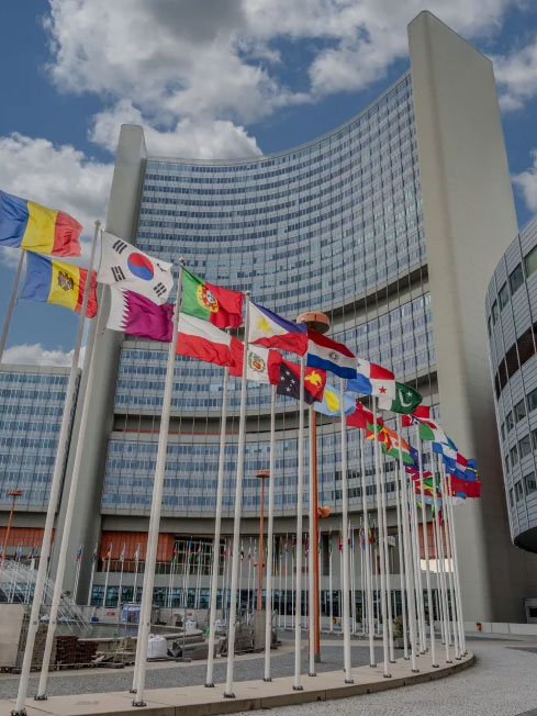 Flags outside the Vienna Center for Disarmament in Austria.