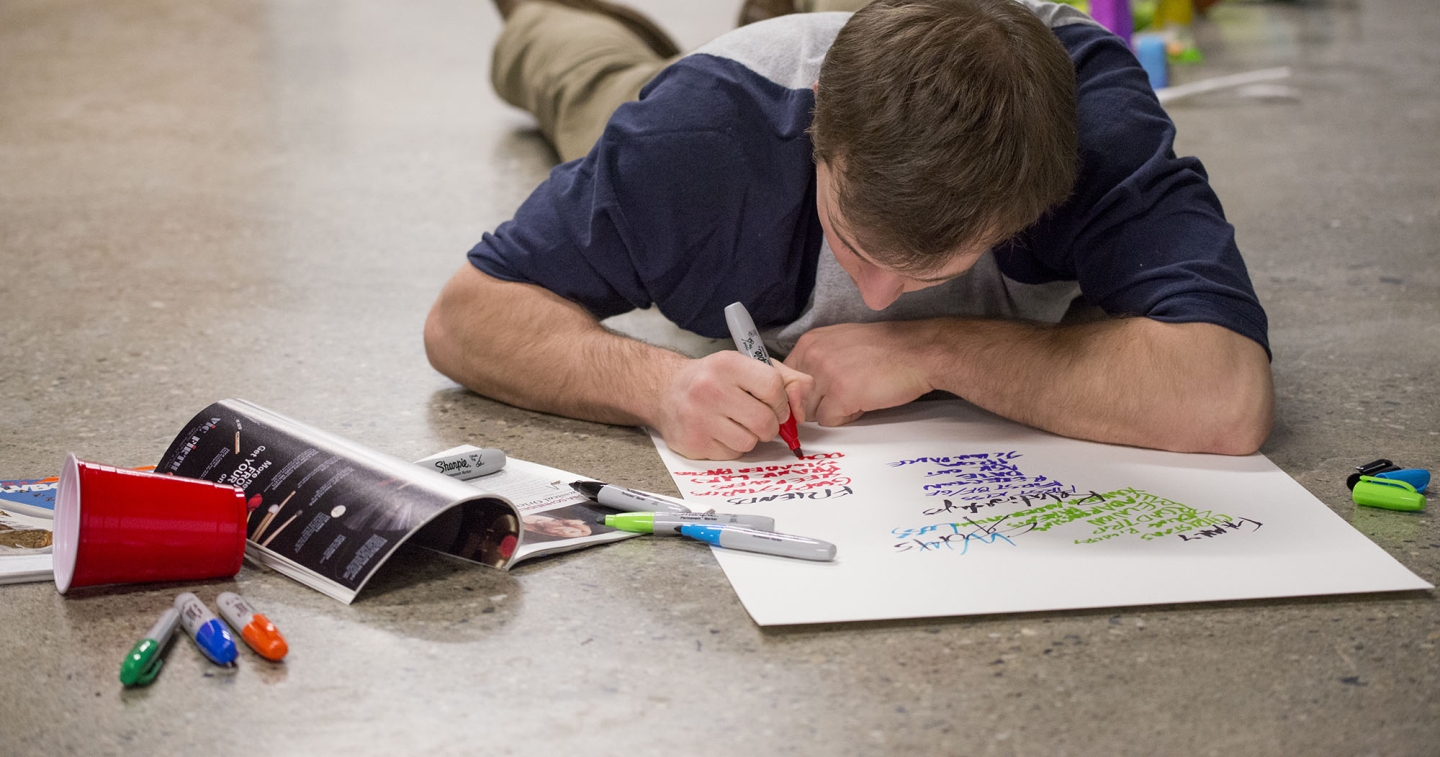 MiddCORE student working on a creative exercise