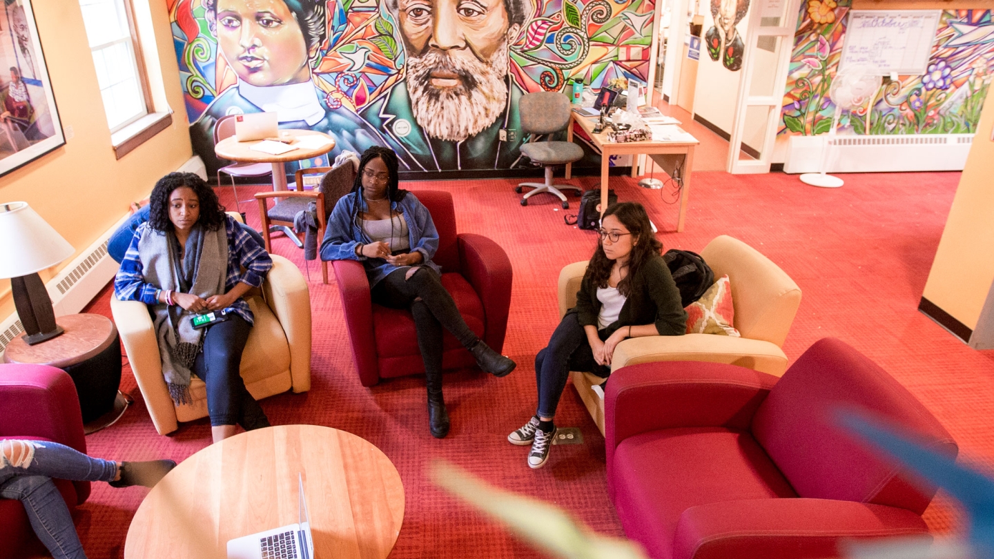 Students having a conversation at the Anderson Freeman Resource Center (AFC) in Carr Hall