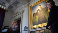 Middlebury College professor William Hart speaks about the life of Alexander Twilight after the unveiling of Twilight’s portrait at the State House Thursday, May 5. At right is Gov. Phil Scott.