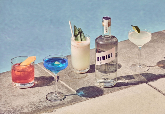 Various cocktails on the edge of the pool