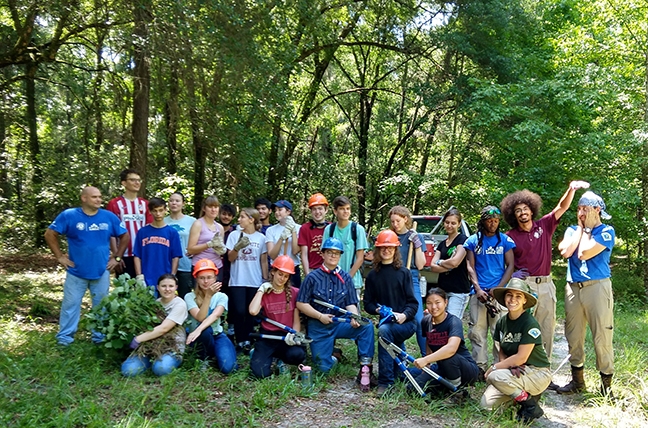 The Young Leaders for Wild Florida joined Americorps to remove invasive species