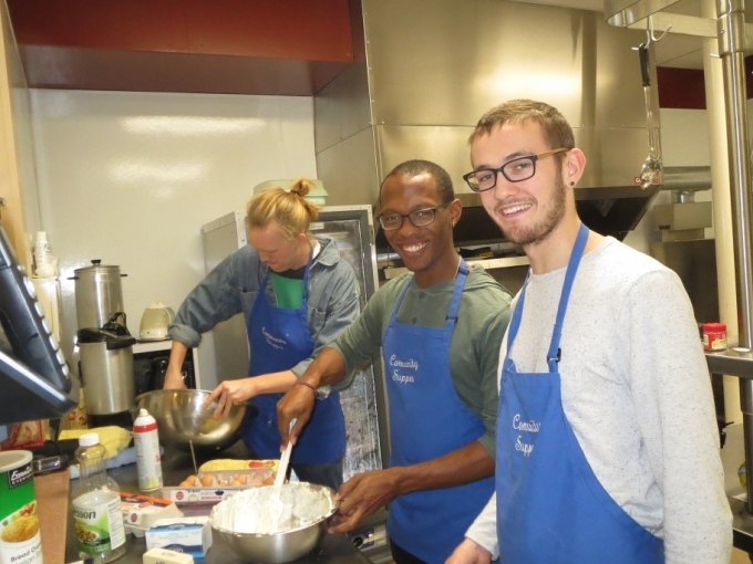 Student volunteers prepare dinner for 250 guests at the Middlebury Community Supper, a program of free weekly meals available to all Addison County residents 