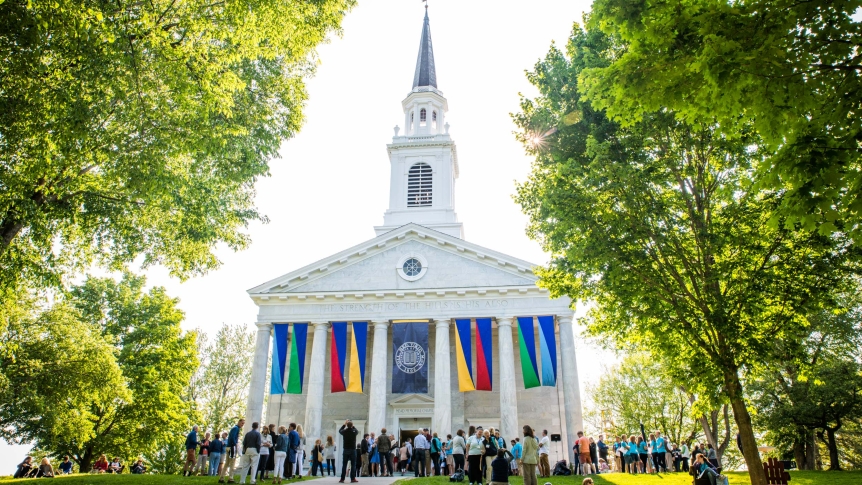 Alumni celebrate during Reunion in front of Middlebury Chapel
