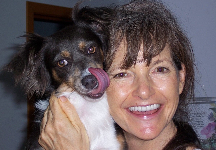 A photo of Alexandra Bernstein with her dog
