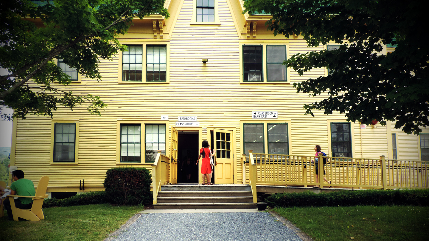 Bread Loaf student Himali enters the Barn classroom.