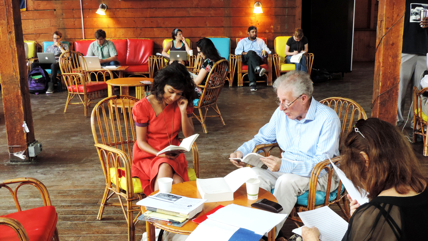 Bread Loaf student discusses a project with her professor in the Barn.