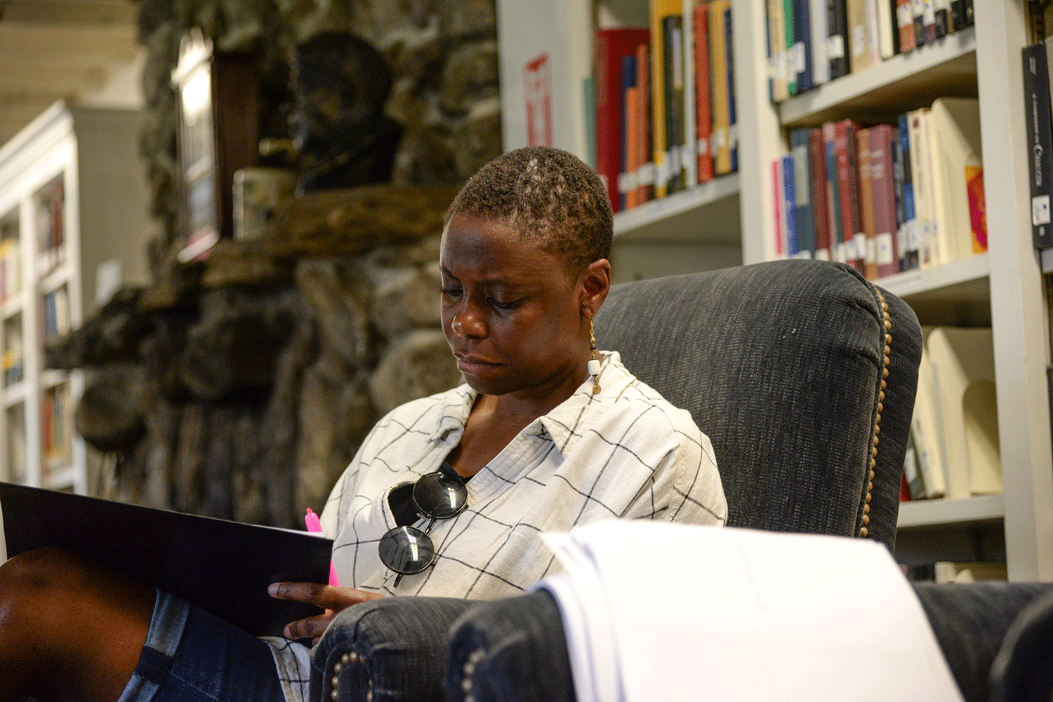student reads in Bread Loaf library 